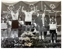 1997 Special Olympics winners on podium with medals