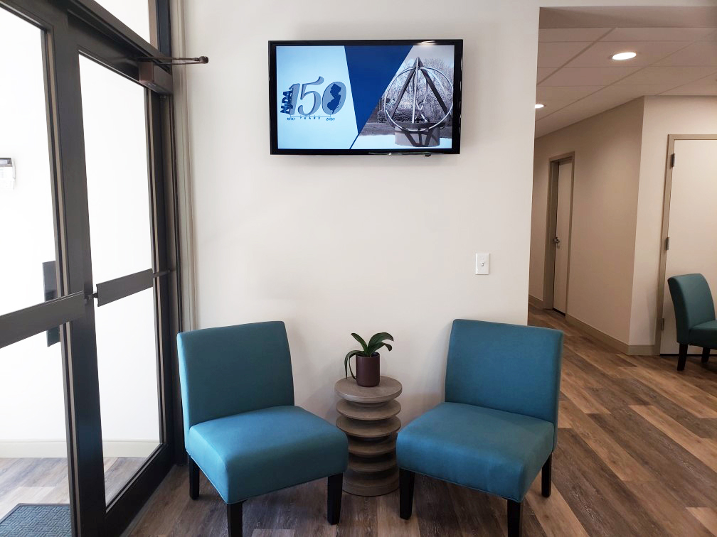 Commercial monitor advertising in dentist lobby